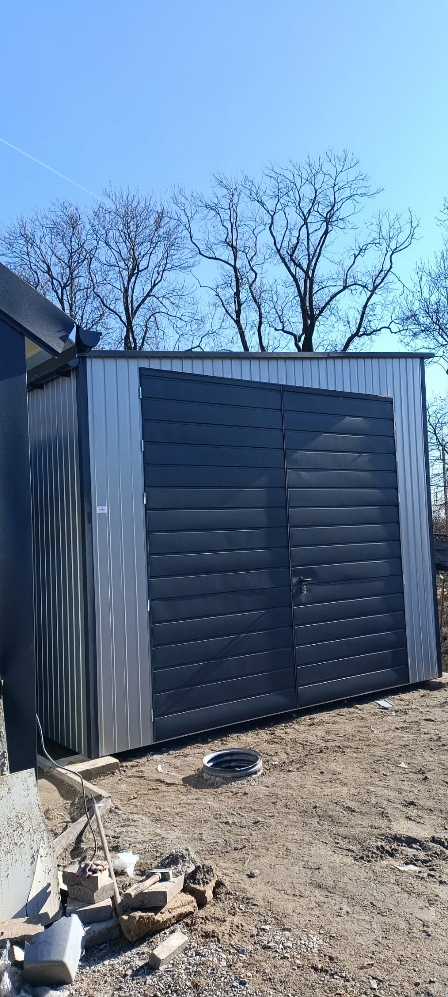 d7e8fafa-995a-4dc7-9778-c7ed8e808e97 Garaż blaszany 4,5 x 8 (G#2) - obrazek 1